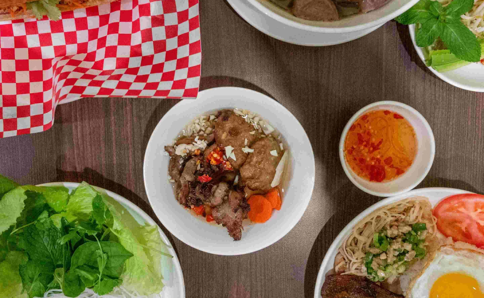 A table of dishes from the Grandma&rsquo;s Kitchen menu, an authentic Vietnamese restaurant in Regina